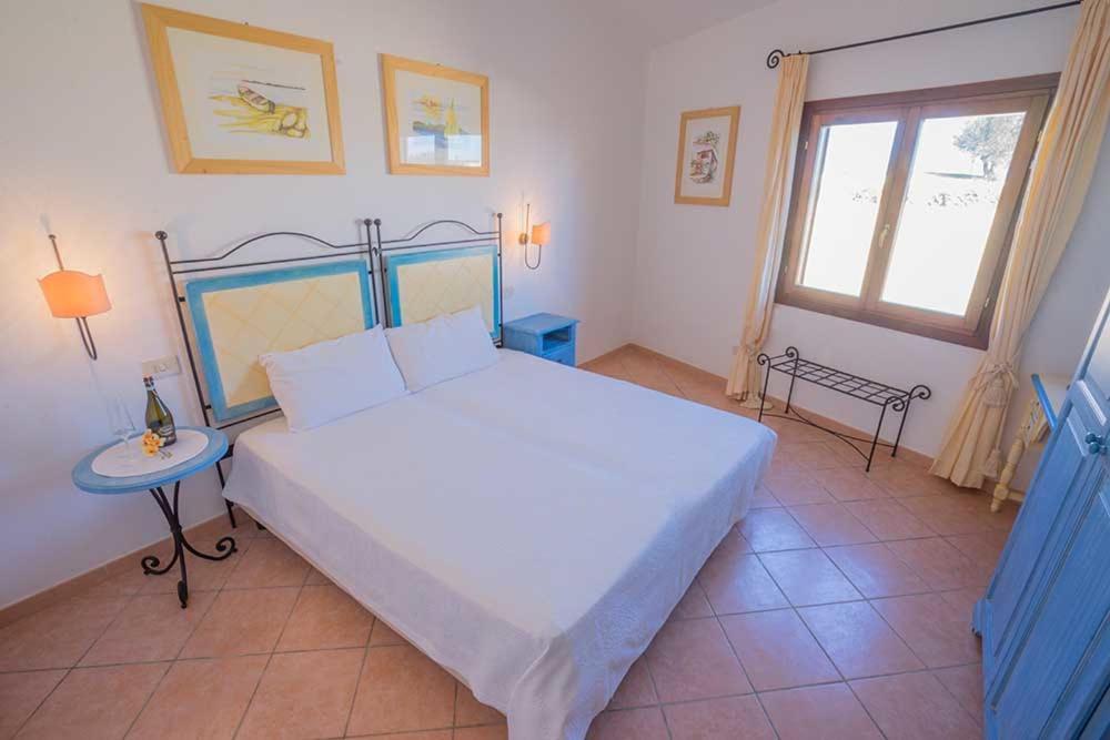 Apartment Baia Sant Anna Con Piscina Tanaunella